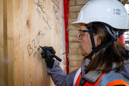 Leader Cllr Bridget Smith signing the board Northstowe Unity Centre